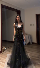 Sexy ball gown with black halter neck, fitted waist, and sequined fishtail skirt. R8065