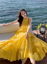 Beach holiday dress hides flesh and makes you look thin. Yellow backless French long skirt R0181