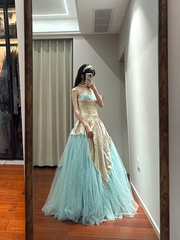 Champagne-colored strapless, fitted, long ball gown with a lake blue skirt R8853