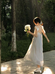 White moonlight three-dimensional suspender dress 2025 new irregular white niche long skirt R0160