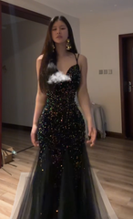 Sexy ball gown with black halter neck, fitted waist, and sequined fishtail skirt. R8065