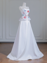 White strapless beaded floral dress with a fitted waist, A-line silhouette, and long ball gown R8243