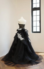 Black strapless lace dress with a fitted waist and full skirt, long ball gown R8541