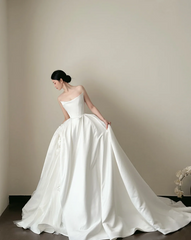 White strapless, waist-cinched, full-skirted floor-length prom gown R7953