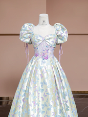 Off-white base with light purple butterfly print, fitted waist, long ball gown with a full skirt R8337