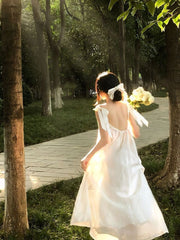 White moonlight three-dimensional suspender dress 2025 new irregular white niche long skirt R0160